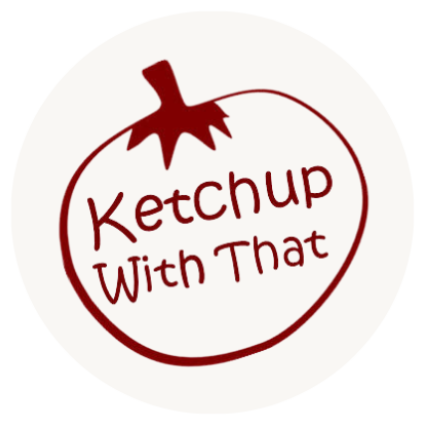 The store logo, which is an outline of a tomato in dark red. In the centre it says The Ketchup With That in the same red.